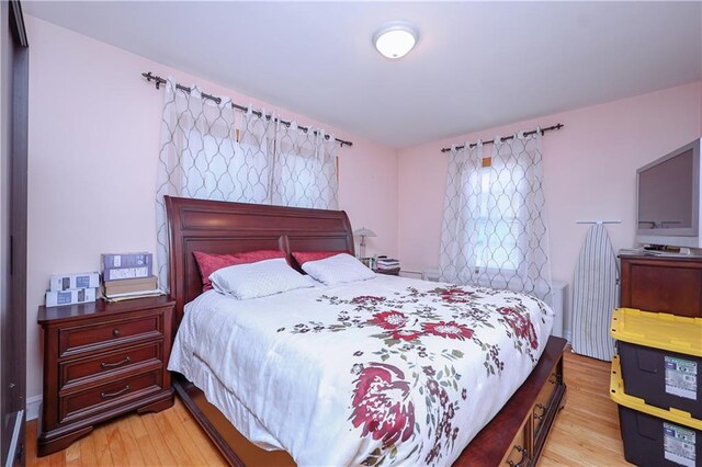 bedroom featuring light hardwood / wood-style flooring