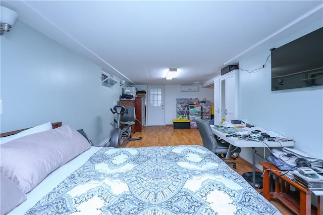 bedroom featuring wood finished floors