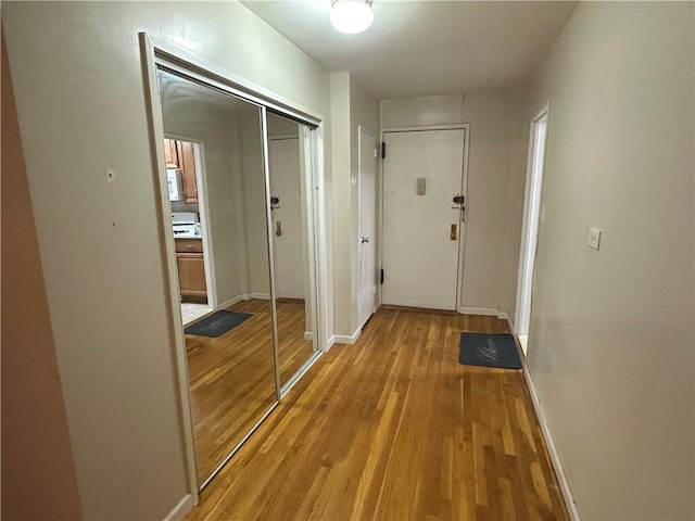 hallway featuring light hardwood / wood-style flooring