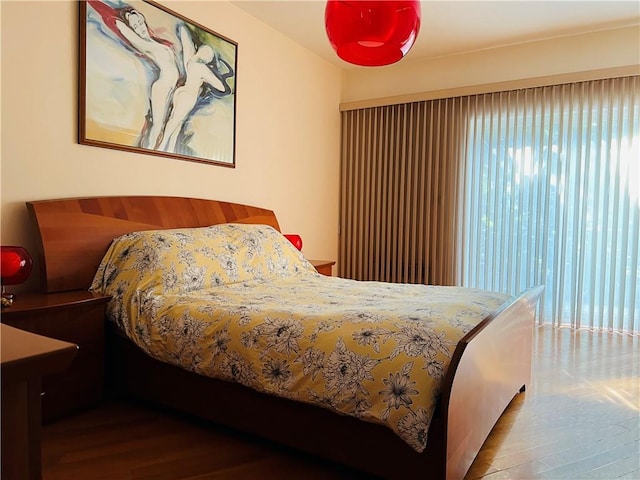 bedroom featuring hardwood / wood-style floors