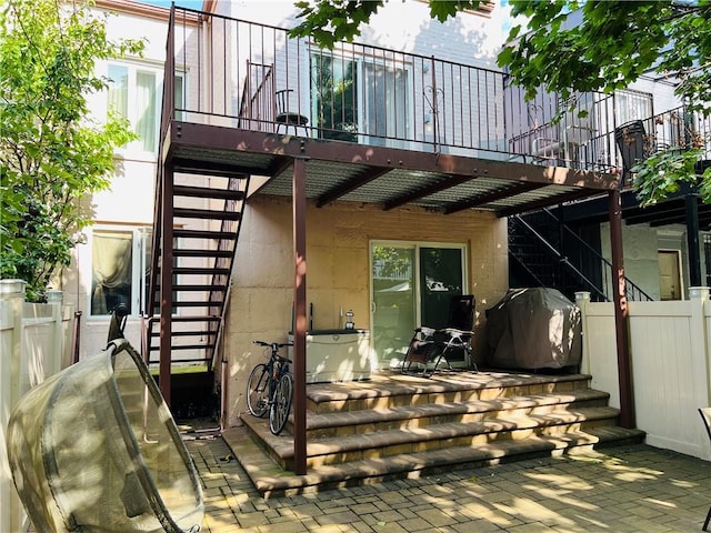 doorway to property with a deck