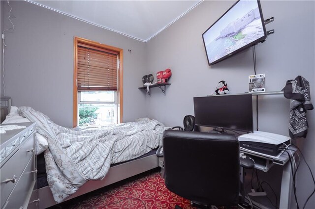 bedroom with ornamental molding