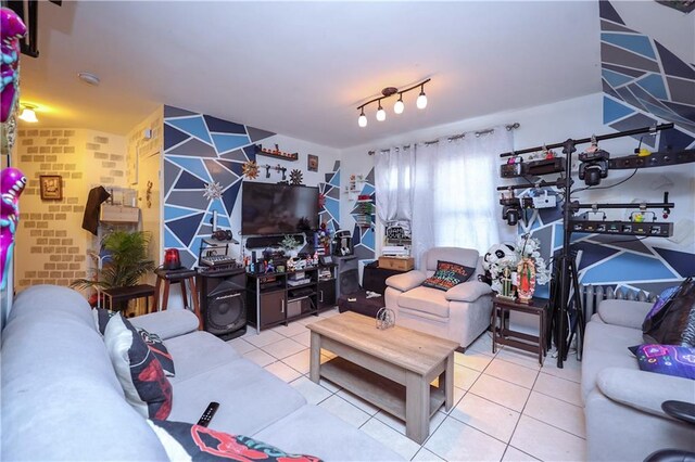 living room with tile patterned flooring