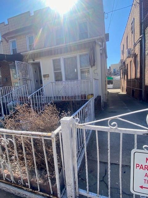 view of front of house with fence