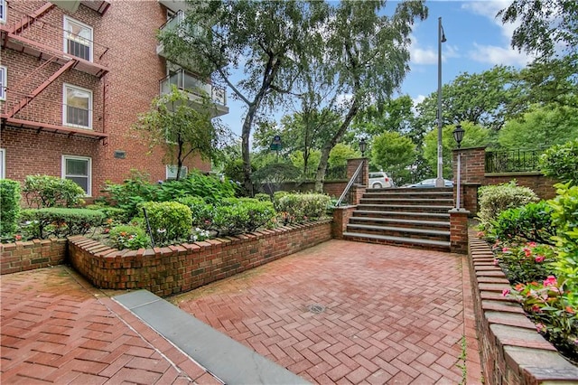 9411 Shore Rd Unit 1A, Brooklyn, NY 11209 - view of patio / terrace with stairway and fence