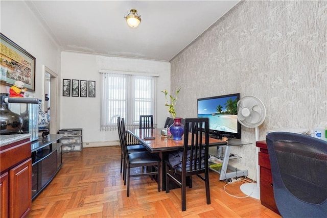 dining area featuring light parquet flooring