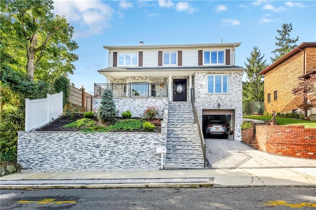 front of property with a garage