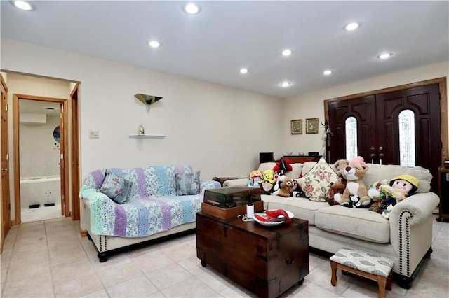 living room with light tile patterned flooring