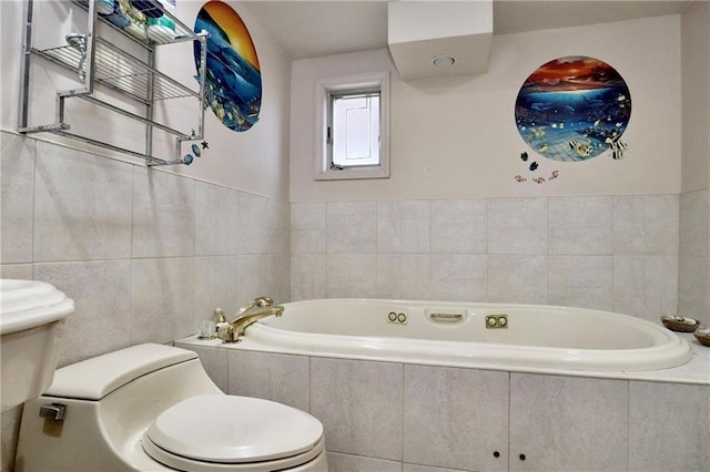 bathroom featuring tile walls, toilet, and a relaxing tiled tub