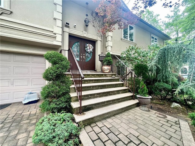 property entrance featuring a garage