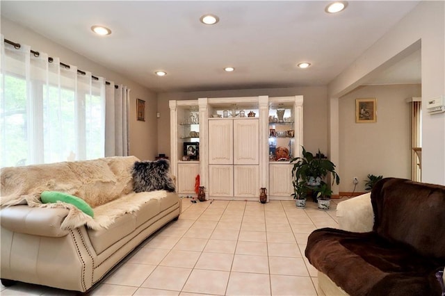 living room with light tile patterned flooring