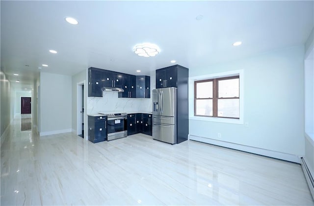 kitchen with under cabinet range hood, backsplash, stainless steel appliances, light countertops, and a baseboard radiator