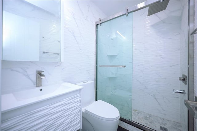 full bath featuring toilet, backsplash, a marble finish shower, tile walls, and vanity