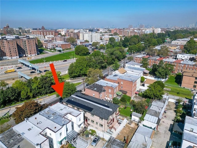 birds eye view of property with a city view