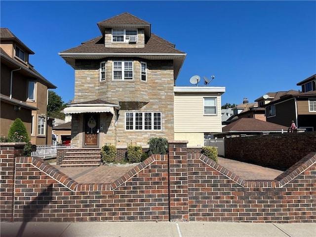 view of front of house with stone siding