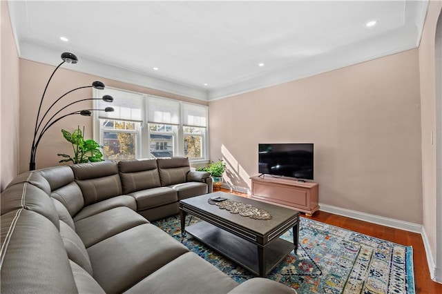 living room featuring ornamental molding and hardwood / wood-style floors