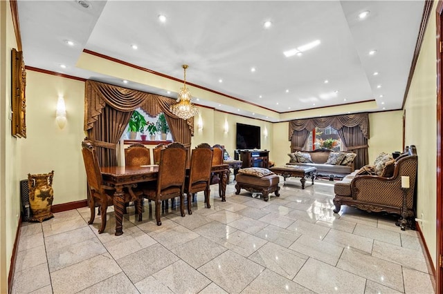 dining space featuring recessed lighting, baseboards, crown molding, and a tray ceiling