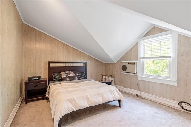 bedroom featuring light carpet, baseboards, and lofted ceiling