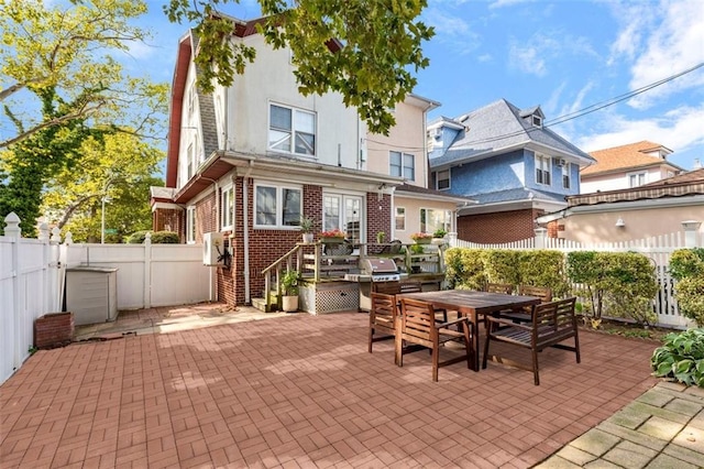 back of house featuring a patio