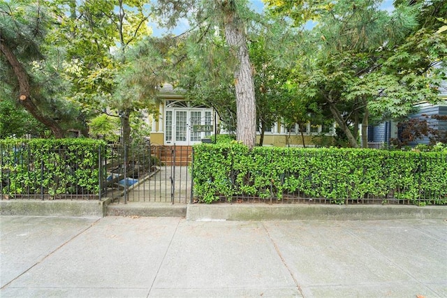 view of property hidden behind natural elements