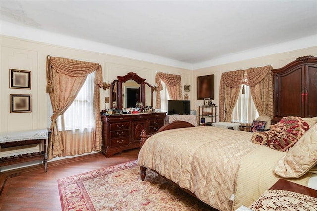 bedroom featuring wood-type flooring