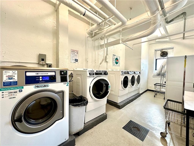 laundry room featuring washing machine and dryer