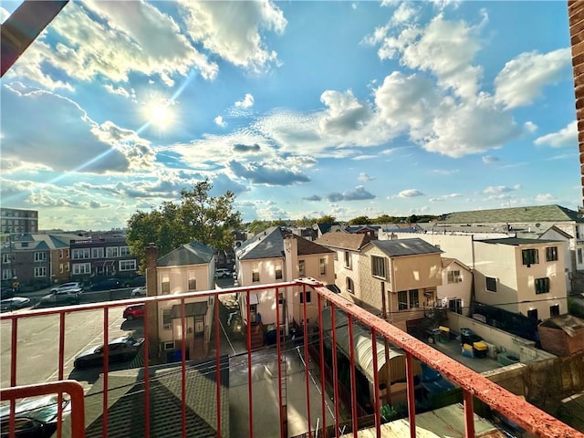 balcony featuring a residential view