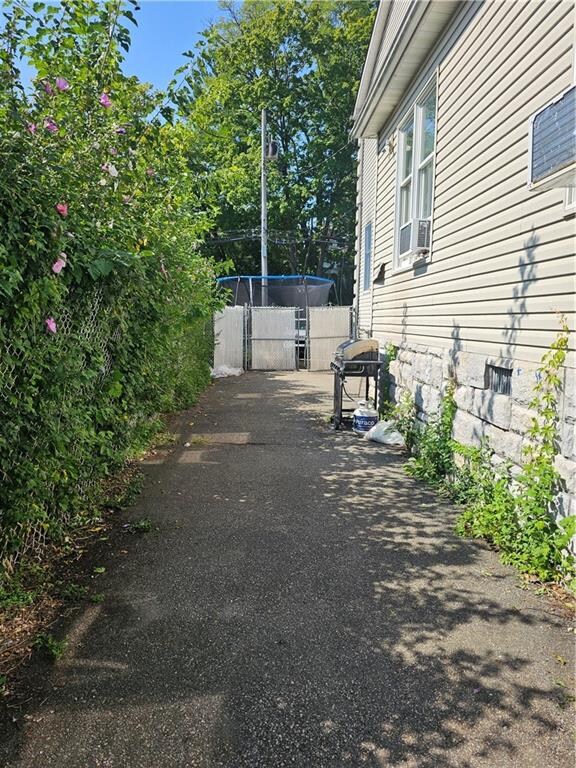 view of property exterior with cooling unit