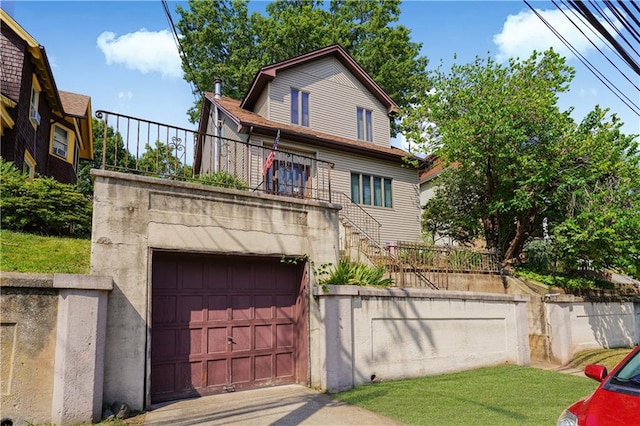 view of front of property featuring a garage