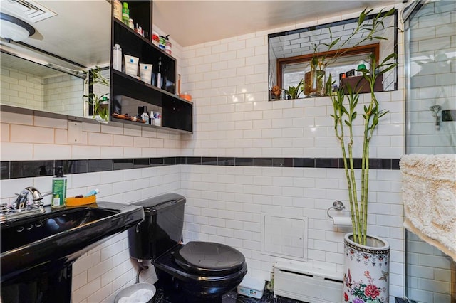 bathroom with decorative backsplash, toilet, baseboard heating, and tile walls