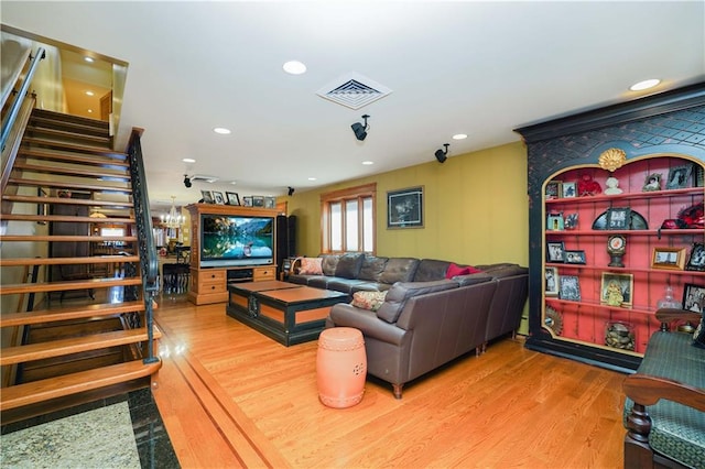 living room with hardwood / wood-style flooring