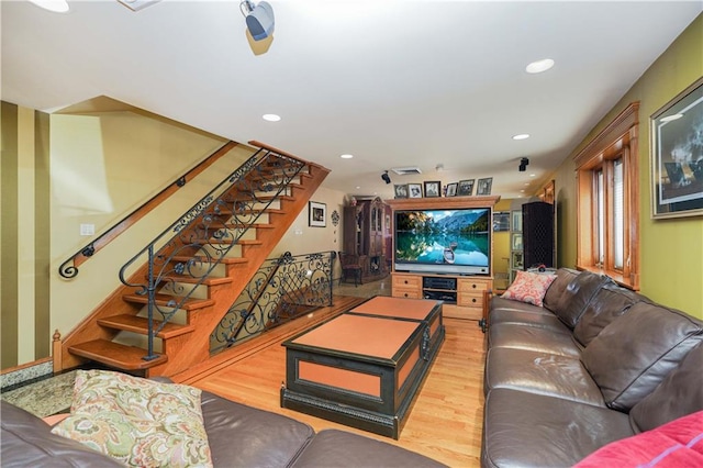 living room with light hardwood / wood-style floors