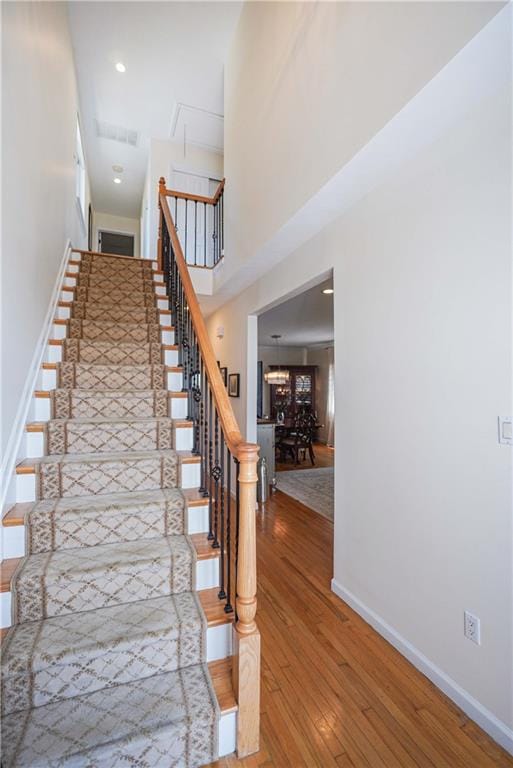 stairway with wood-type flooring