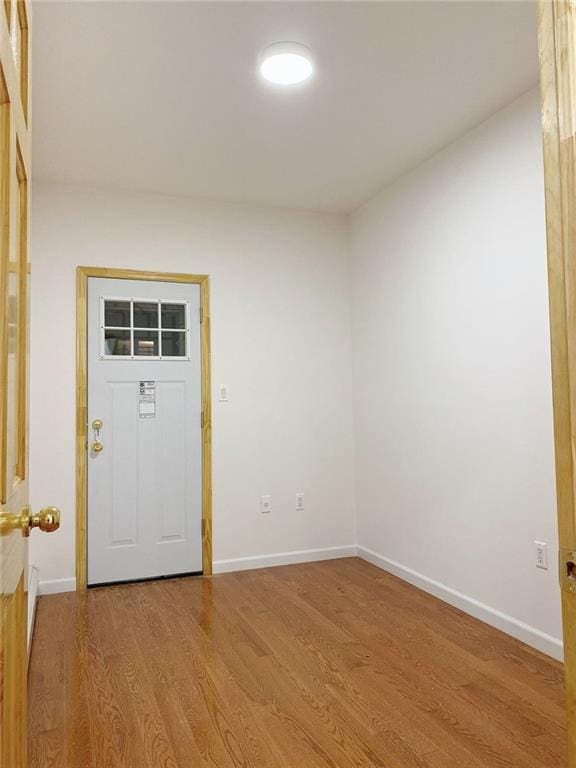 entrance foyer featuring hardwood / wood-style floors