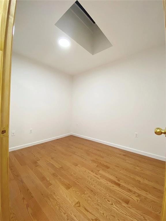 unfurnished room featuring light hardwood / wood-style flooring