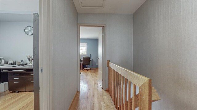 hall with light hardwood / wood-style flooring