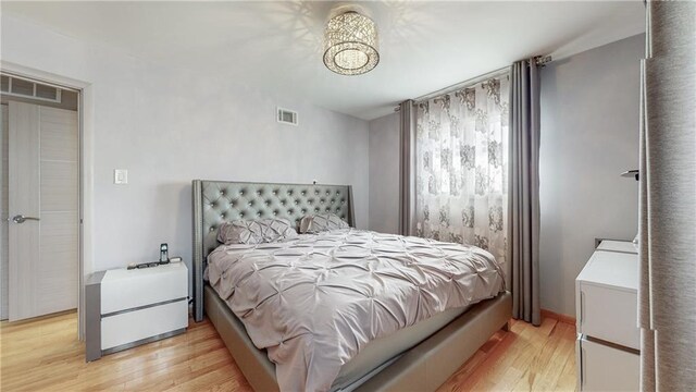 bedroom featuring light wood-type flooring