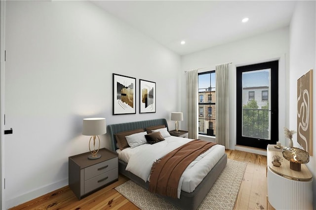 bedroom featuring recessed lighting, light wood-type flooring, and baseboards