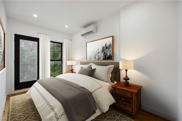 bedroom featuring a wall mounted air conditioner and hardwood / wood-style floors