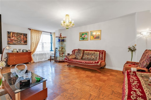 living room with light parquet flooring and an inviting chandelier