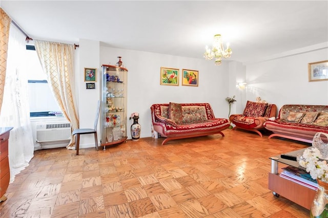 living room with a chandelier and a wall mounted air conditioner