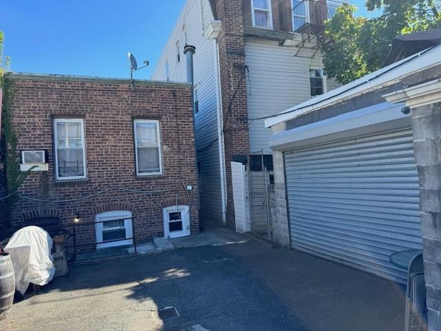 view of property exterior featuring a garage