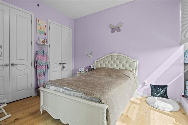 bedroom featuring light hardwood / wood-style floors