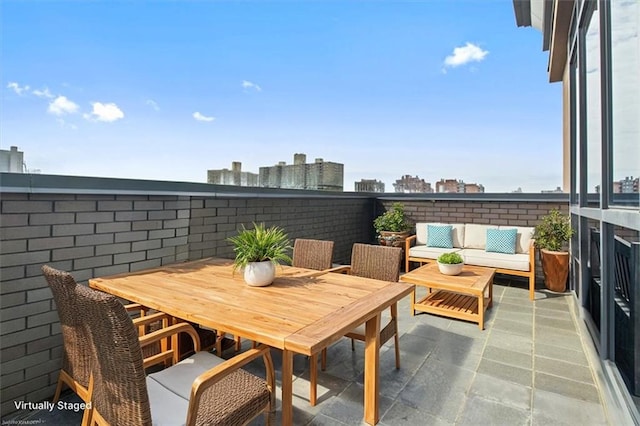 view of patio featuring outdoor dining space and outdoor lounge area