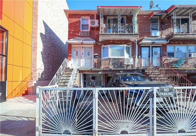 15 Bay 20th St, Brooklyn, NY 11214 - view of property featuring brick siding and stairway