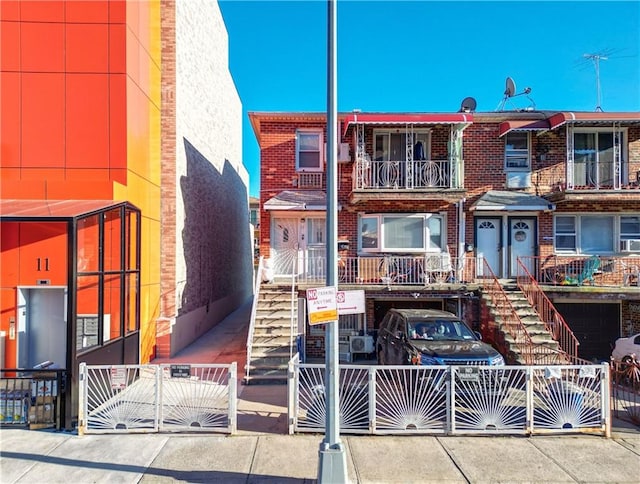 15 Bay 20th St, Brooklyn, NY 11214 - view of property featuring stairway and brick siding