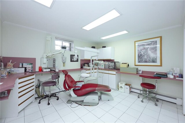 tiled office featuring crown molding and baseboard heating