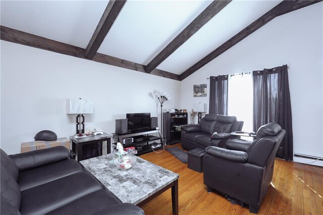 living room with beam ceiling, hardwood / wood-style flooring, high vaulted ceiling, and a baseboard heating unit