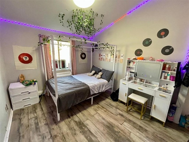 bedroom featuring wood-type flooring