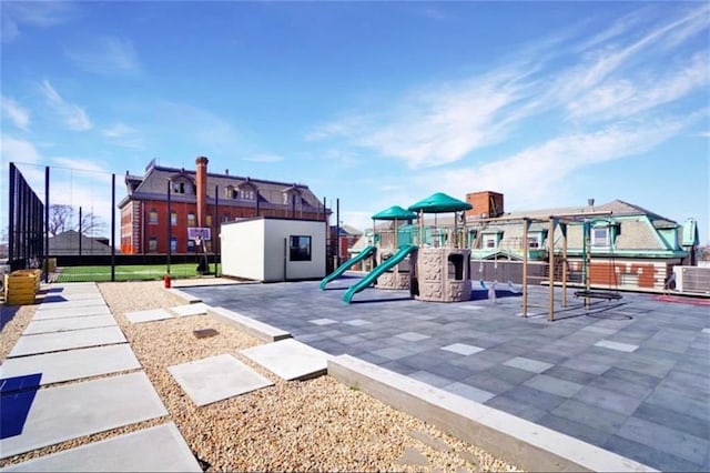 view of play area with central air condition unit